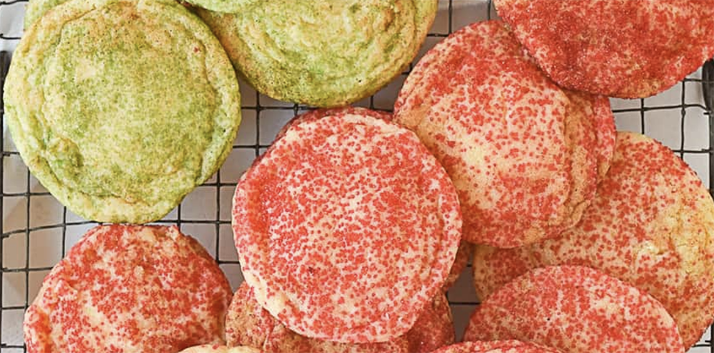 Christmas Snickerdoodle Cookies decorated with red and green sugar on a holiday platter.