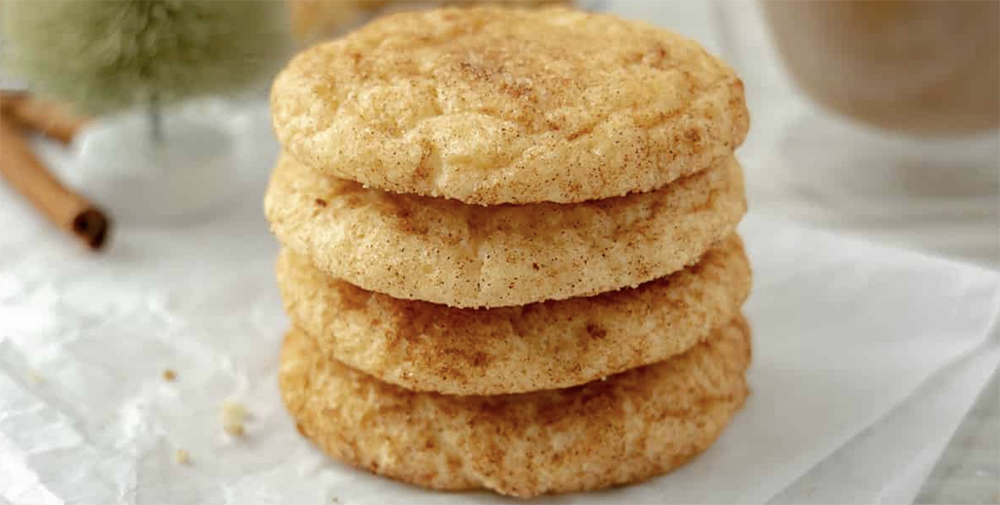 Christmas Snickerdoodle Cookies decorated with red and green sugar on a holiday platter.