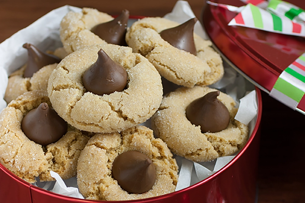 Holiday peanut butter cookies, festive peanut butter blossoms, Christmas chocolate cookies